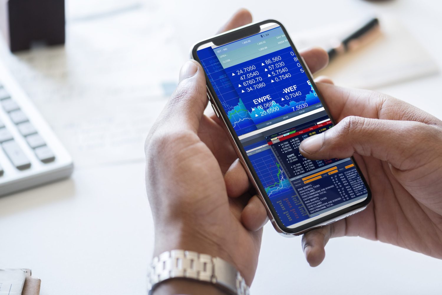 Businessman checking stock market online